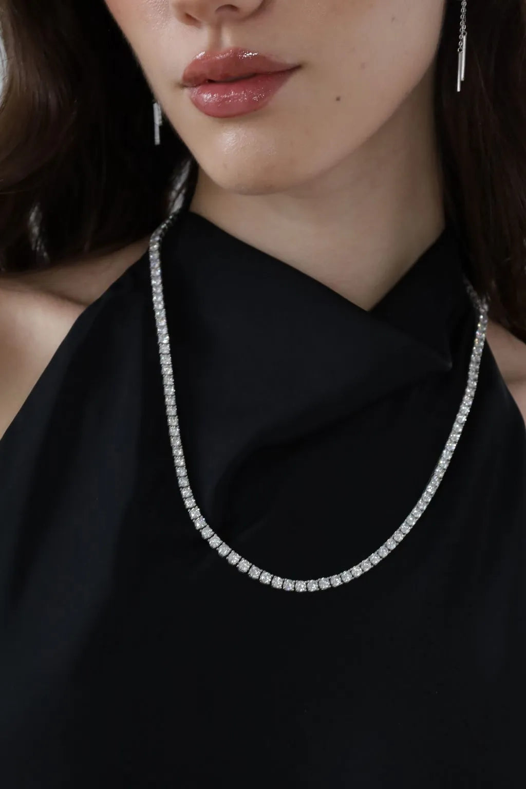 Model wearing Elme Classic Tennis  Necklace and Celeste Drop earrings set in sterling silver